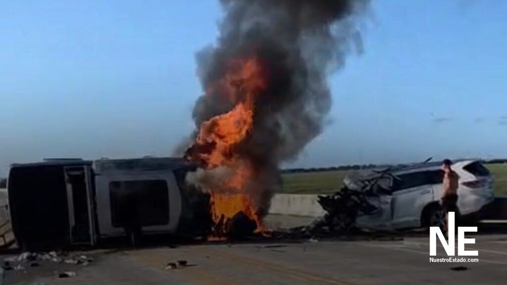 Ford F-150 truck engulfed in flames after a head-on collision on Isle of Palms Connector where a Venezuelan delivery driver helped rescue victims.